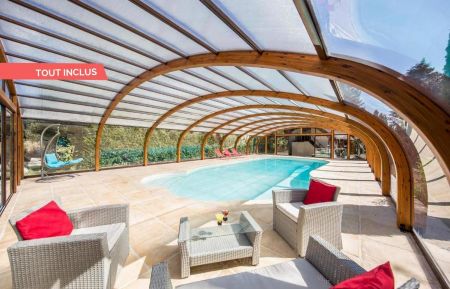 la piscine couverte et son espace détente Gîte n°1518 Bois-Normand-près-Lyre - Eure - la piscine couverte et son espace détente